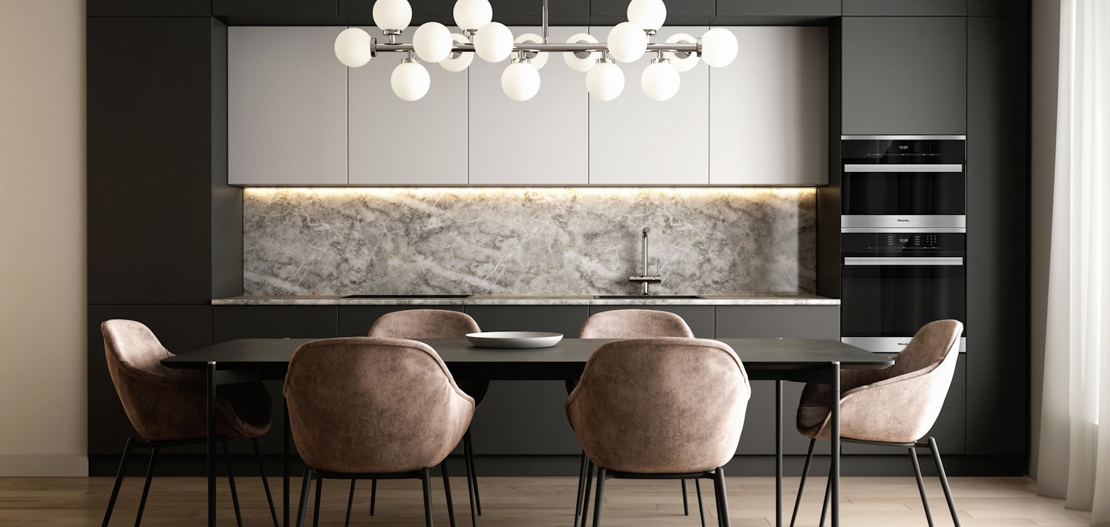 A dining room lit by a row of pendant lamps