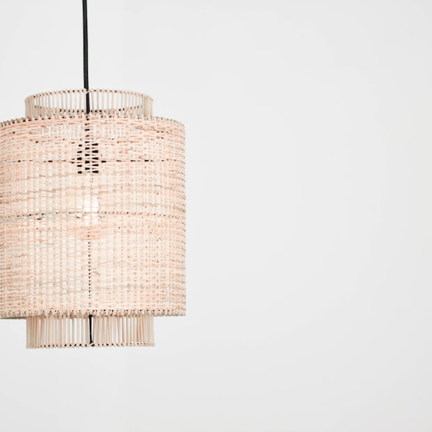 A woven pendant shade in natural fibre
